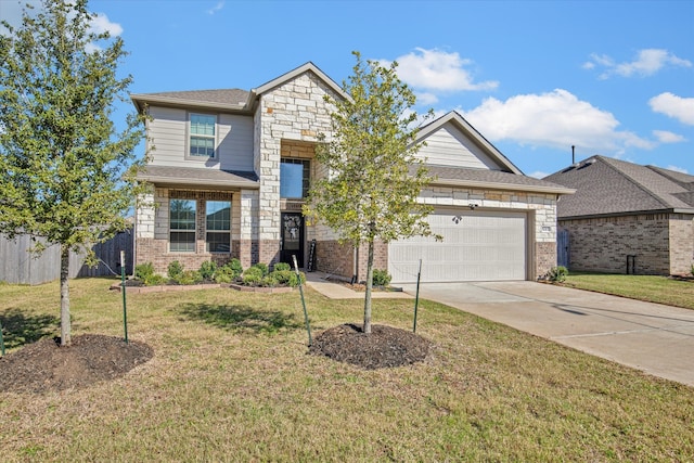 view of front of home with a garage and a front lawn