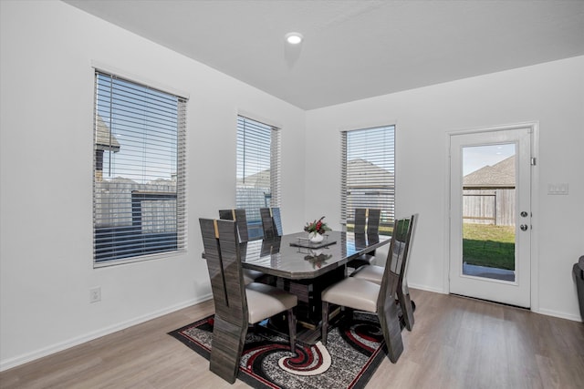 dining room with light wood-type flooring