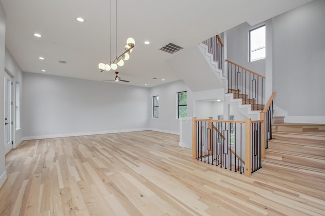 unfurnished living room with light wood-type flooring