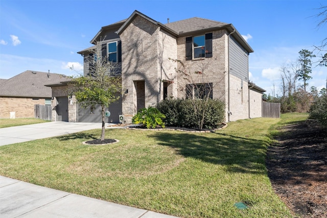 view of front of house featuring a garage and a front lawn