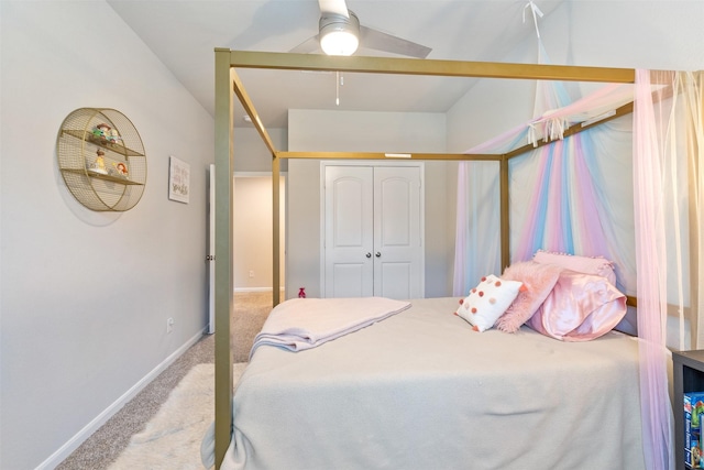 bedroom featuring a closet, ceiling fan, and light colored carpet