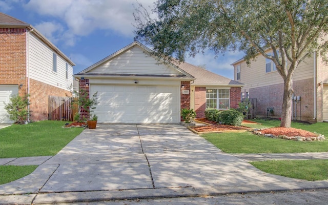 view of front facade featuring a front yard and a garage