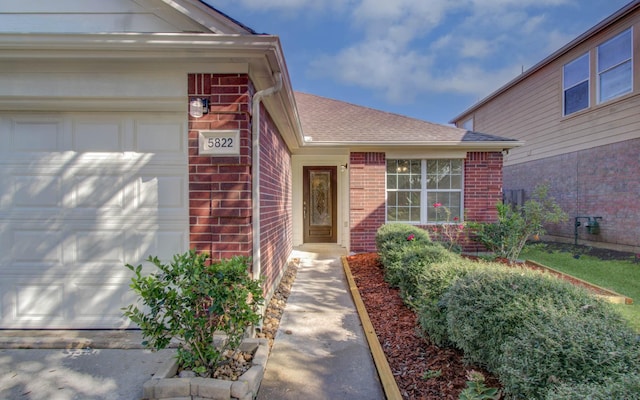 entrance to property featuring a garage