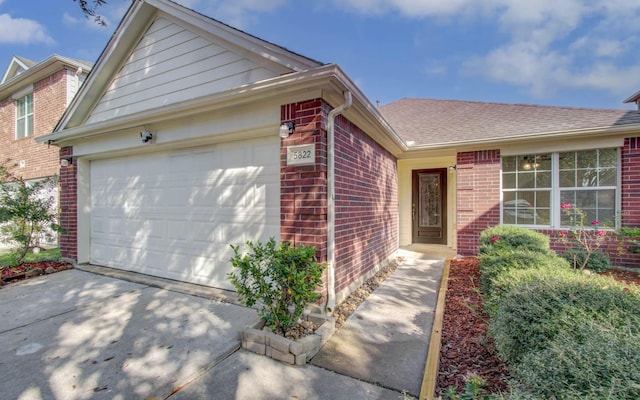 single story home with a garage