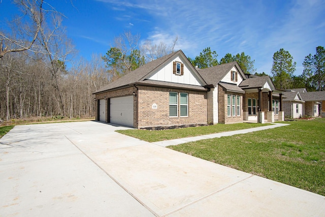 view of front of property with a front lawn and a garage