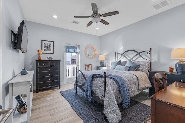 bedroom featuring light wood-type flooring and ceiling fan