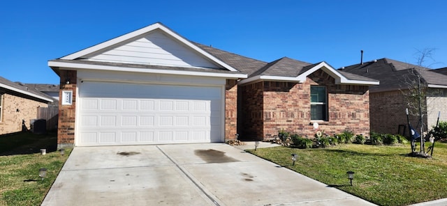 ranch-style house with a front lawn and a garage