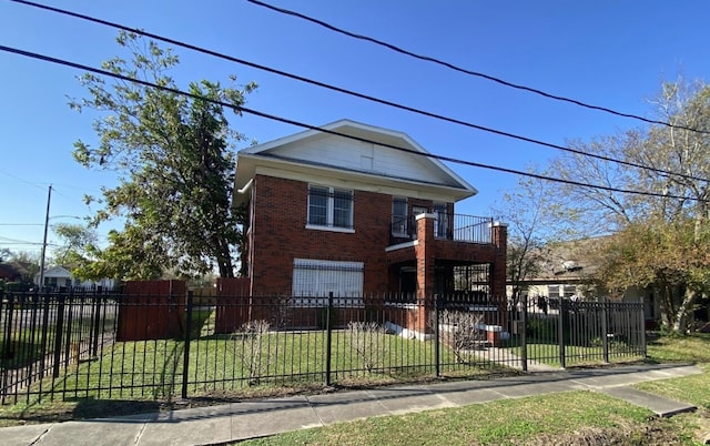 view of front facade with a front yard