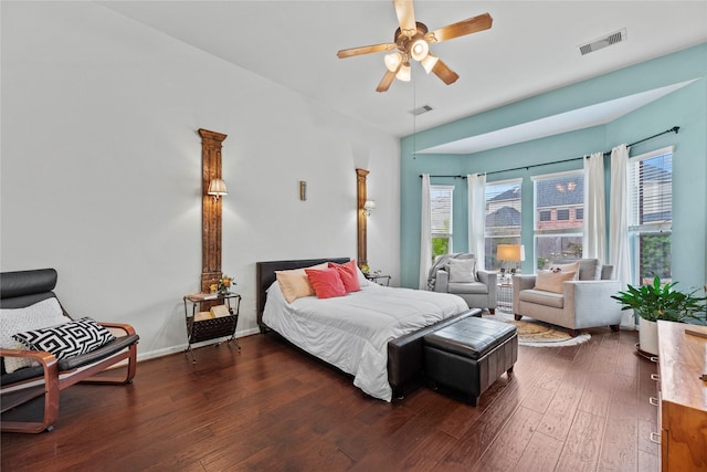 bedroom featuring ceiling fan and dark hardwood / wood-style flooring