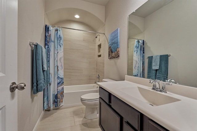 full bathroom featuring vanity, toilet, and shower / tub combo