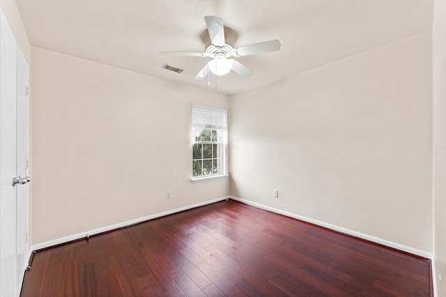 spare room featuring ceiling fan and wood-type flooring