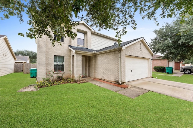 view of front of house featuring a garage and a front yard