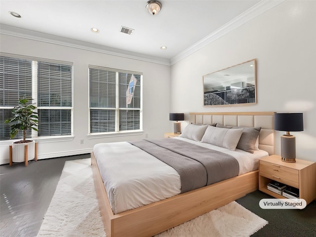 bedroom with ornamental molding