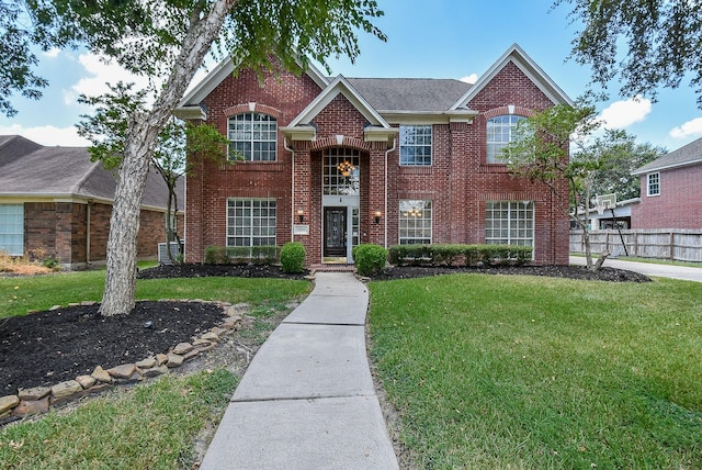 front facade with a front lawn