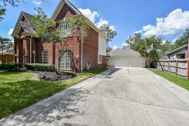 view of side of home featuring a yard and a garage