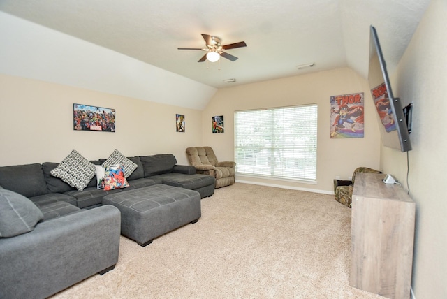 living room featuring light colored carpet, vaulted ceiling, and ceiling fan