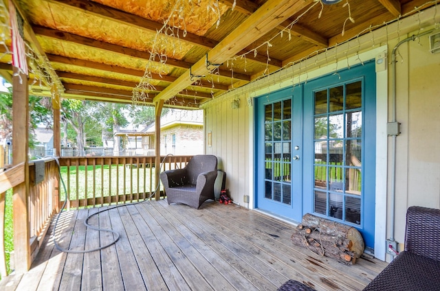 wooden terrace featuring french doors