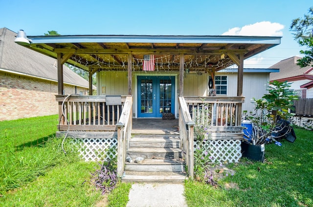 view of front of property featuring french doors and a porch