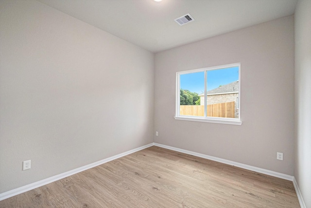 empty room with light wood-type flooring