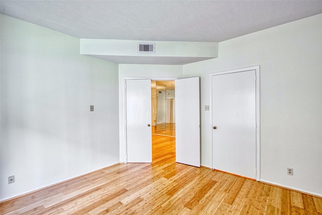 empty room featuring light wood-type flooring