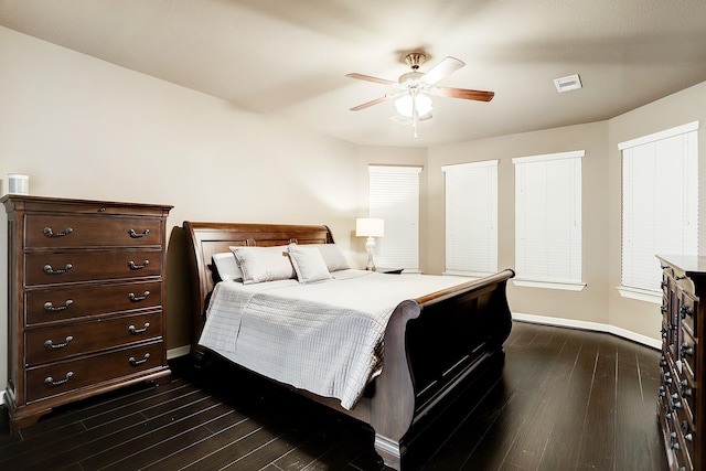 bedroom featuring ceiling fan and dark hardwood / wood-style flooring