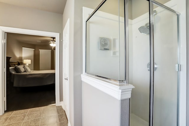 bathroom featuring ceiling fan and walk in shower