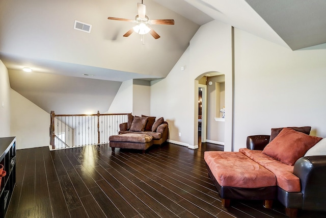 sitting room featuring dark hardwood / wood-style flooring, vaulted ceiling, and ceiling fan