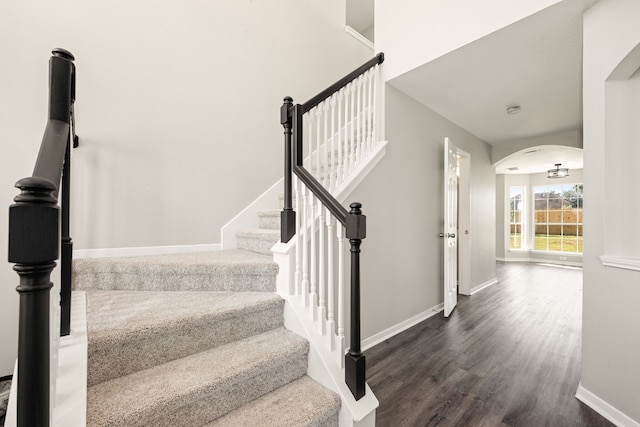 stairway with wood-type flooring