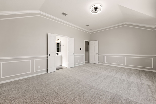 interior space featuring carpet and lofted ceiling