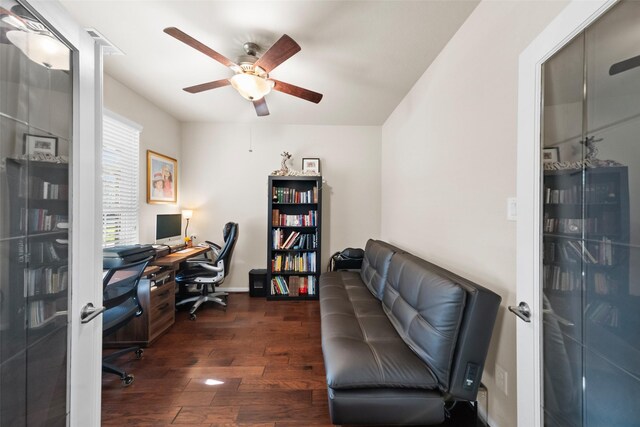 office space with ceiling fan and dark wood-type flooring