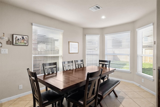 dining area featuring light tile patterned floors