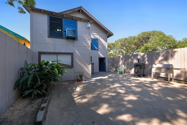 rear view of property with a patio