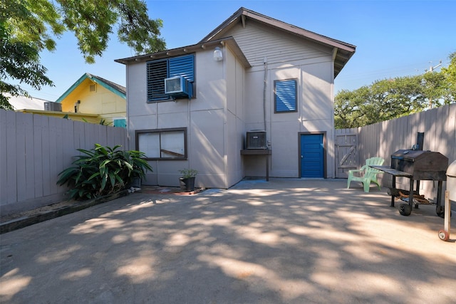 exterior space featuring a patio and fence