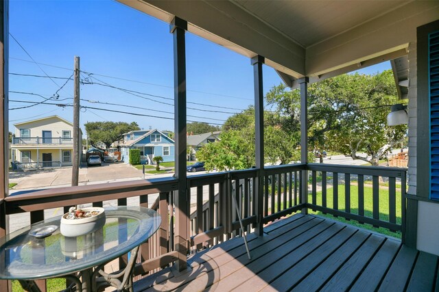 wooden terrace with covered porch