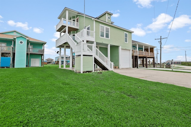 back of property featuring a carport and a lawn