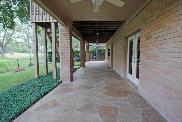 view of patio with french doors and ceiling fan