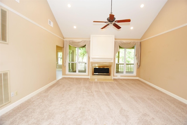 unfurnished living room featuring ceiling fan, light colored carpet, and high vaulted ceiling