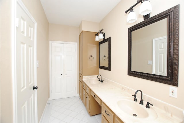 bathroom with vanity and tile patterned flooring