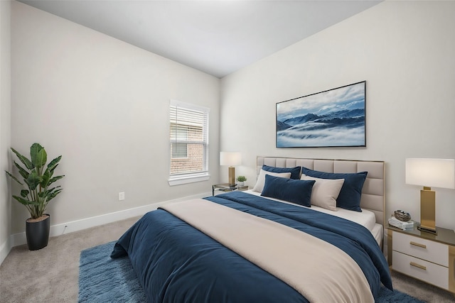 bedroom featuring light carpet