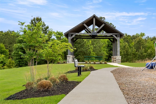 view of home's community with a gazebo and a lawn