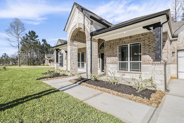 view of front of home with a front lawn and covered porch