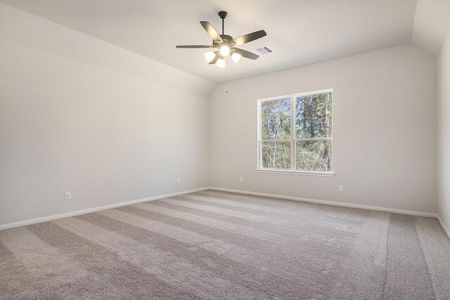 unfurnished room with carpet flooring, ceiling fan, and lofted ceiling