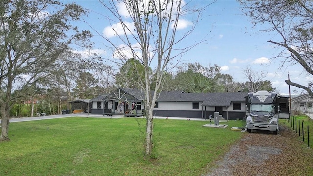 view of front of home featuring a front lawn