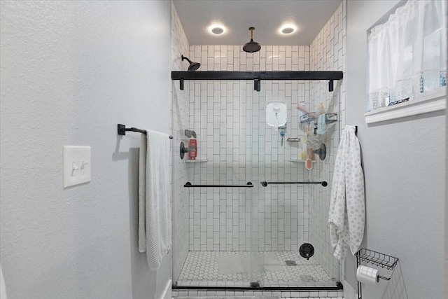 bathroom featuring walk in shower