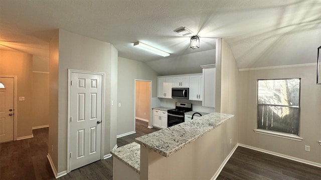 kitchen with kitchen peninsula, stainless steel appliances, white cabinetry, and light stone counters