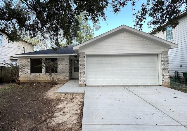 single story home with a garage