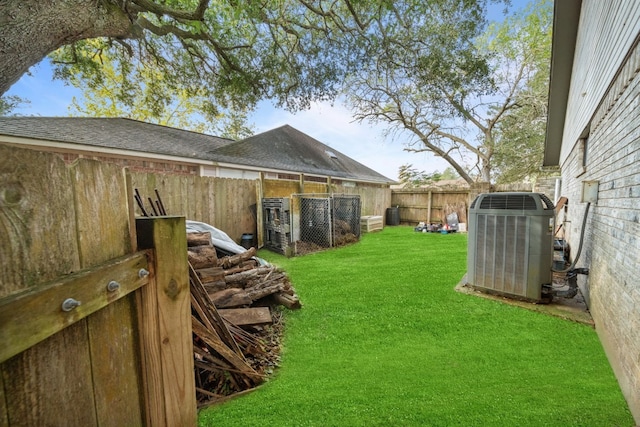 view of yard with central AC unit