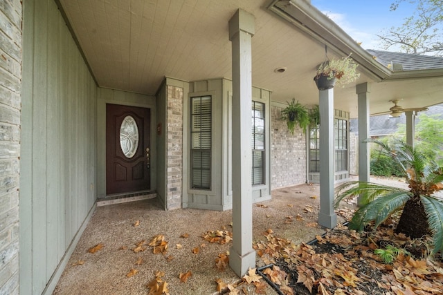 property entrance featuring covered porch