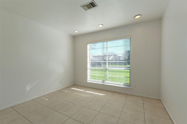 view of tiled spare room