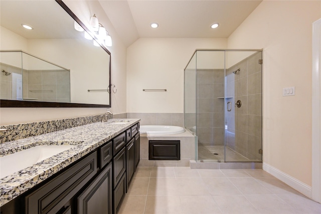 bathroom featuring vanity, separate shower and tub, and tile patterned floors